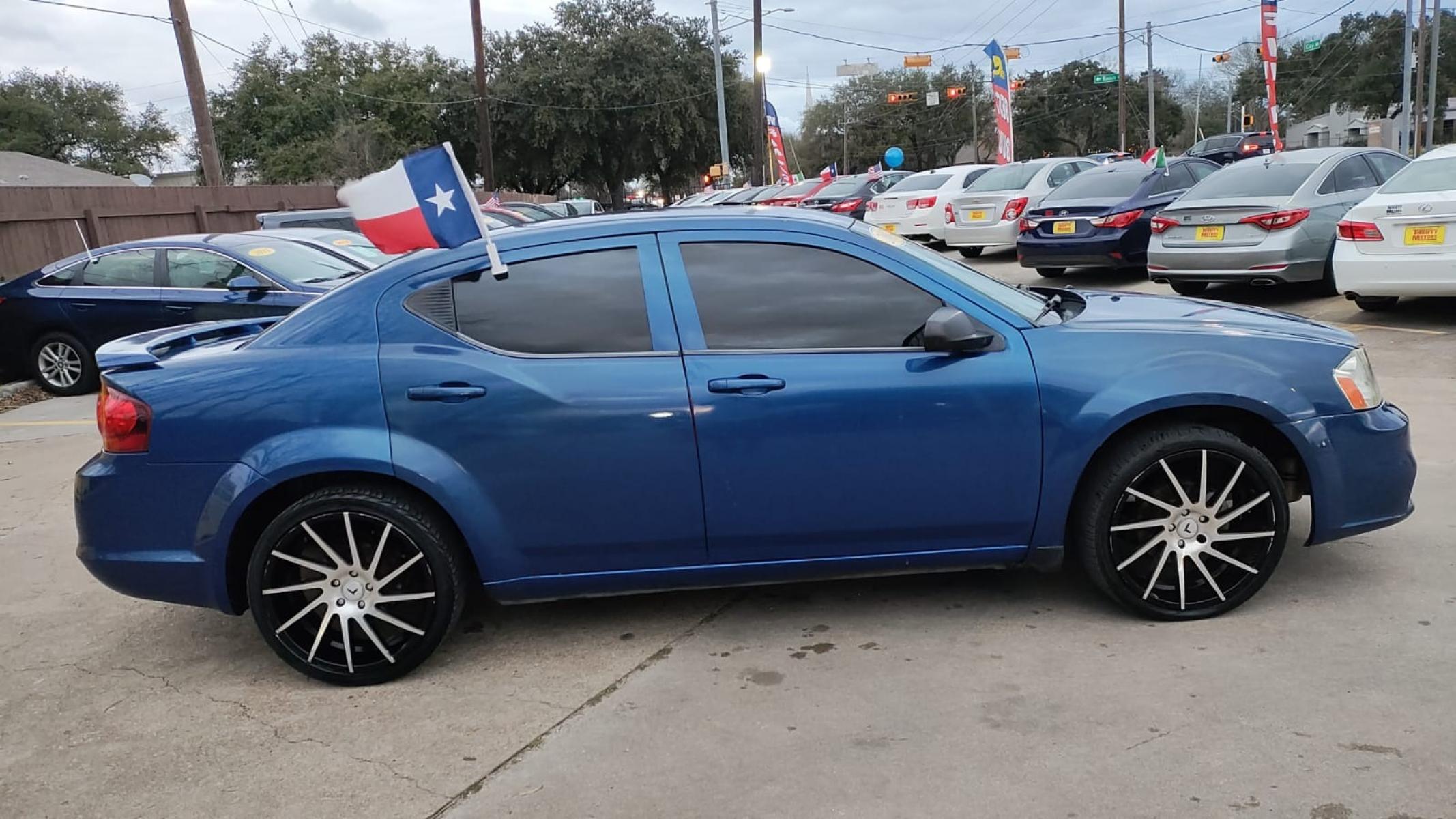 2014 Dodge Avenger SE (1C3CDZAB6EN) with an 2.4L L4 DOHC 16V engine, 4-Speed Automatic transmission, located at 16710 Clay Rd., Houston, TX, 77084, (281) 859-7900, 29.834864, -95.656166 - Photo #0